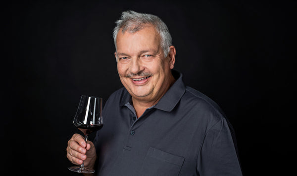 René Gabriel holding a wine glass