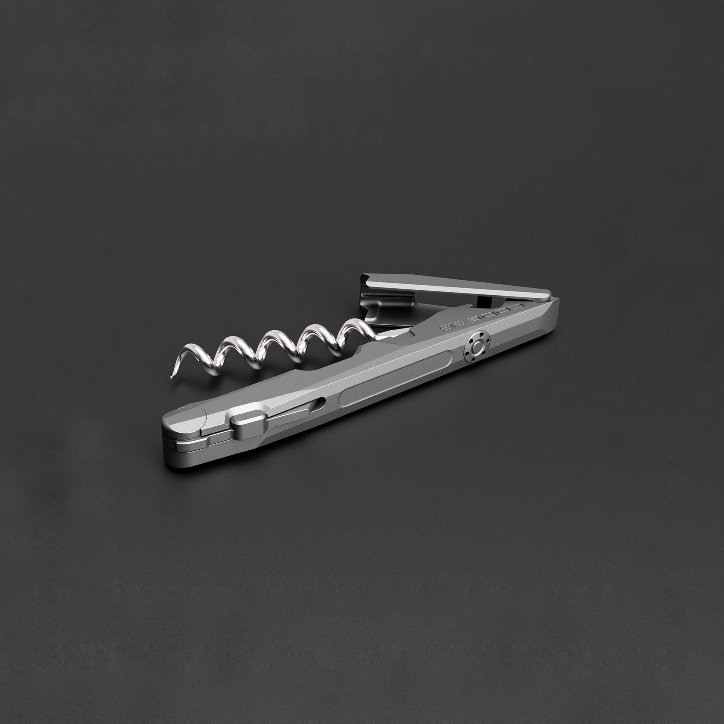 Metallic corkscrew on a dark gray background